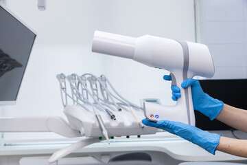Advanced Dental Imaging Equipment: A Modern Handheld X-Ray Device for Precise Diagnosis in Dental Clinics and Practices © Viktoriia