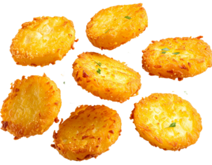 Crispy golden hash browns floating on white