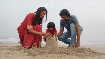 Indian family having playful time together on the beach during summer vacation - Parents and child concept - Models by AI generative - Powered by Adobe