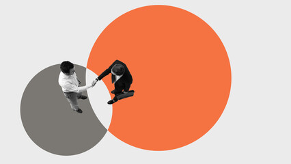 Conceptual artwork of businessmen shaking hands in intersecting circles symbolizing merger integration. Concept of goal alignment, and joint collaboration process.