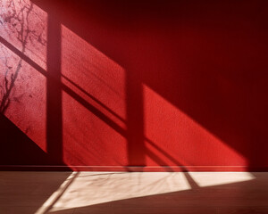 Red and white patterns accent the minimalist office interior, featuring a red book on a light wall
