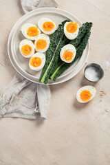 Plate with halves of delicious boiled eggs.