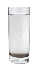 Glass with dirty water isolated on white