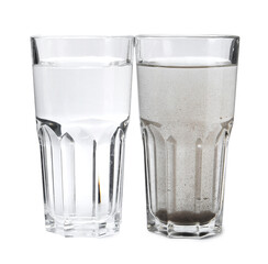 Glasses with clean and dirty water isolated on white