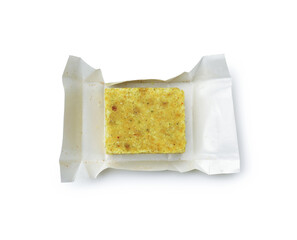 One aromatic bouillon cube isolated on white, top view