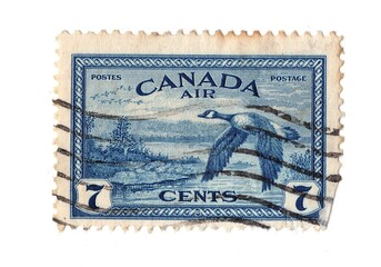 A vintage postage stamp from Canada isolated on a white background.