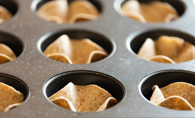 baked tortilla cups ready to fill party food close up