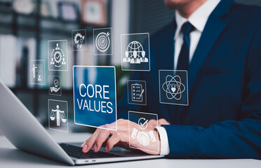 Business Core Values and Corporate Culture Concept. Businessman working on laptop with core values...