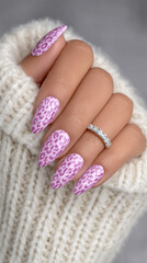 Stylish acrylic nails featuring a leopard print design for a trendy look.