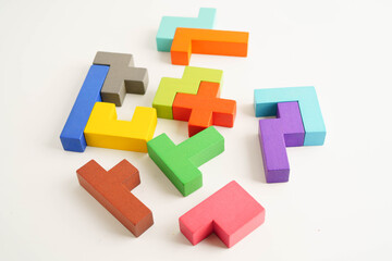 Logical thinking and problem solving problem solution creative business, wooden puzzle geometric block shape.