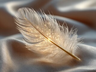 Glowing Feather Resting on Soft Fabric in Serene Close-Up