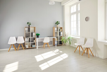 Empty modern office workplace with wooden table, boardroom with desk, chairs for group briefing or...