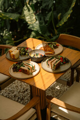 Healthy Sandwich with Fresh Ingredients on Rustic Wooden Table

