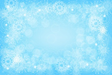 Winter background with snowflakes on a beautiful blue backdrop, Christmas background for cards, snowfall. Snowy natural landscape, winter dust.