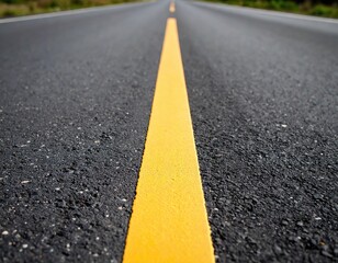 Asphalt road with yellow dividing line