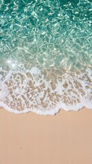Visual harmony of turquoise sea and pale beach captured from above, suitable for spa visuals, summer ads, or ocean backdrops