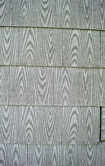 Obraz premium Exterior asphalt based siding needs repair