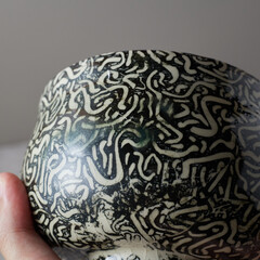 Tea bowl ceramic on gray background.