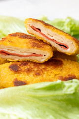 cordon bleu chicken nuggets with salami in close-up