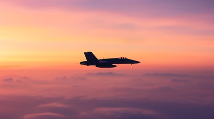 Silhouette of a fighter jet soaring through a vibrant sunset sky