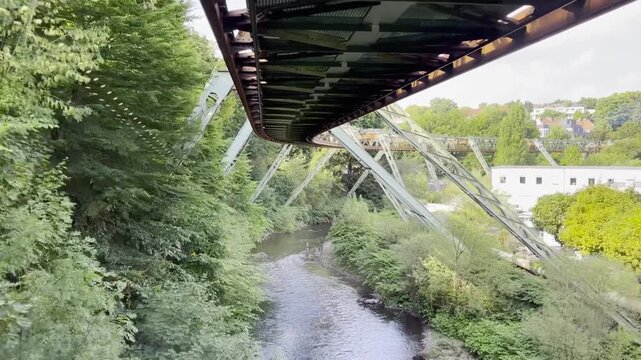 Scenic Ride on the Wuppertal Suspension Railway (Schwebebahn) &ndash; Cabin View of German City Landscape and Urban Transit 