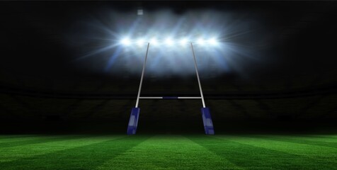 Rugby goalpost is standing floodlit on grass turf with padded base in flat design at night