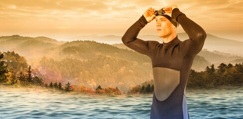 Male swimmer against sea and sky