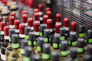 Wine bottles arranged at market