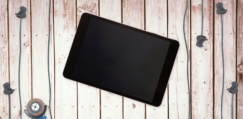 Tablet pc on wooden surface