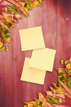 Fototapeta Autumn leaves with yellow note