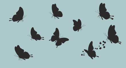 Obraz premium Enchanting silhouettes: A flutter of butterflies gracefully dance in the sky, casting a magical spell