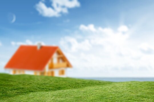 Fototapeta Flat design showing rolling meadow leading toward red-roofed two-story house with sea, cloudy sky