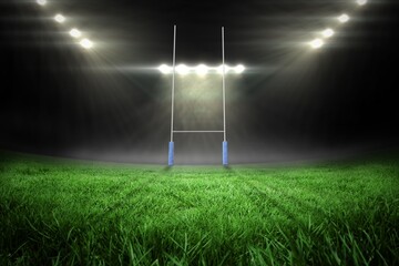 rugby goal post is standing on pitch with blue uprights under glowing floodlights in flat design © vectorfusionart
