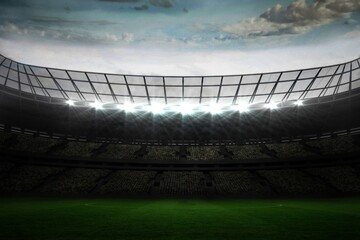 Large football stadium under blue sky