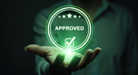 Human hand holding glowing green digital approved emblem with stars and checkmark