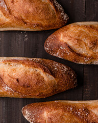  The golden-brown crust and artisanal scoring highlight the texture and quality of traditional European-style bread, perfect for bakery ads, food photography, and culinary publications.