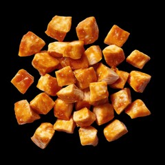 Assorted Cube-Shaped Caramel Candies on Black Background for Sweet Treat and Dessert Inspiration