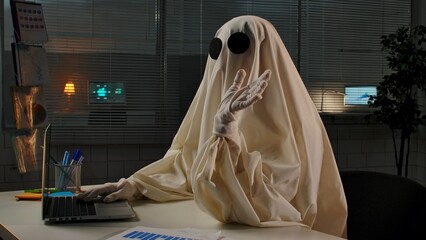 Ghost in Office Environment Working on a Computer Project