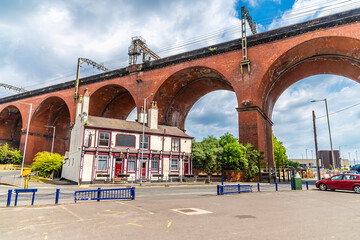 Fototapeta premium A view looking up at the largest viaduct in the UK at Stockport, Manchester in summertime