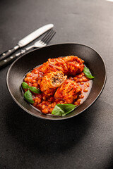 Stuffed cabbage tomato sauce with beans meat, cabbage, fresh delicious gourmet food background on the table rustic food top view copy space