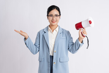 Enthusiastic spokesperson shares message with a megaphone dressed in business casual attire