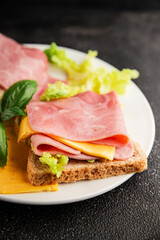 Sandwich ham, cheese, bread toast meat spam fresh delicious gourmet food background on the table rustic food top view copy space