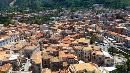 Panoramic view of Tropea, charming town with its characteristic houses and red tiled roofs, located in Calabria, Southern Italy