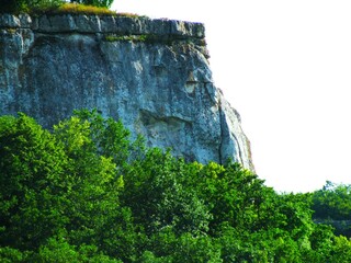Beautiful mountain landscape featuring verdant hills and a clear blue sky. Crimea, Ukraine