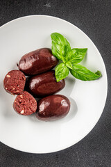 Black pudding sausage fresh delicious gourmet food background on the table rustic food top view copy space