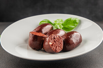 Black pudding sausage fresh delicious gourmet food background on the table rustic food top view...