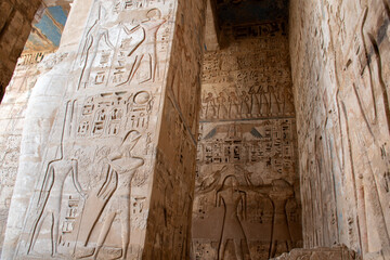 Exploring the Temple of Medinet Habu in the Valley of the Nobles in Luxor, Egypt.