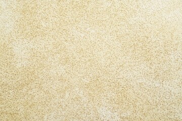 Fototapeta premium Gold sandpaper-textured background surface design beige.