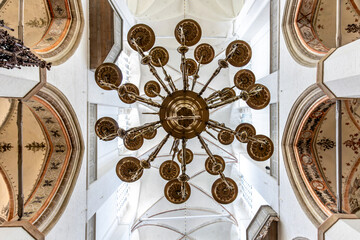 Vintage chandelier. Ceiling decor. Architectural details