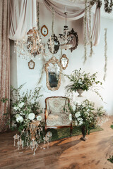 Elegant floral decoration with vintage seating in a beautifully arranged indoor space